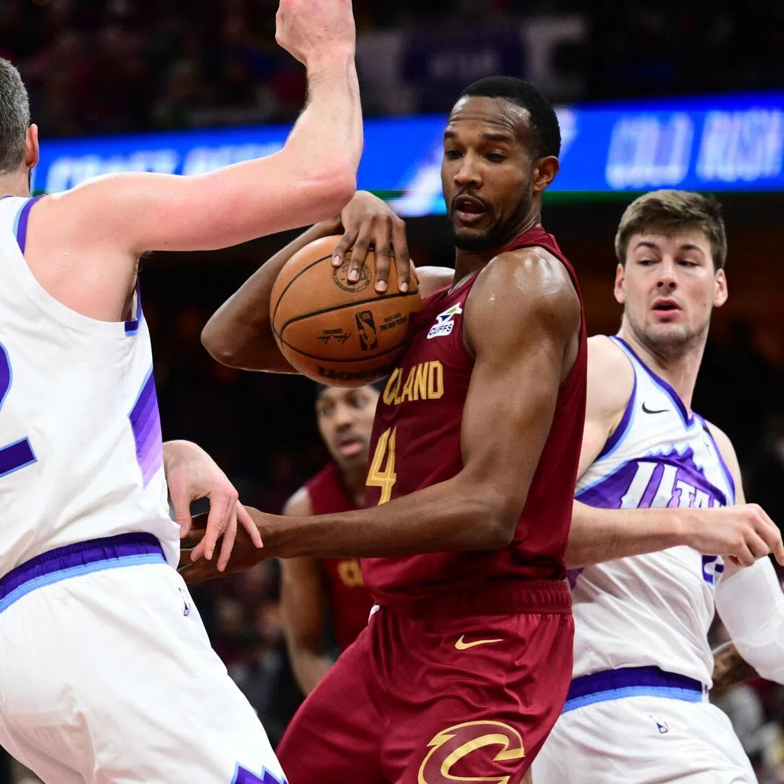 Cleveland Cavaliers center Evan Mobley goes for a rebound against the Utah Jazz during the second half at Rocket Arena.