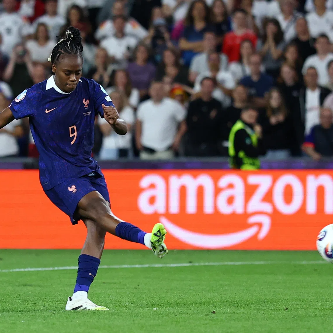 FILE PHOTO: Soccer Football - UEFA Women's Euro 2025 - Quarter Final - France v Germany - St. Jakob-Park, Basel, Switzerland - July 19, 2025  France's Melvine Malard scores a penalty during a penalty shootout REUTERS/Matthew Childs/File Photo