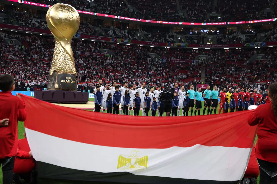 Soccer Football - FIFA Arab Cup - Qatar 2025 - Group C - Egypt v Jordan - Al Bayt Stadium, Al Khor, Qatar - December 9, 2025 General view as the Egypt players line up during the national anthems before the match REUTERS/Ibraheem Al Omari