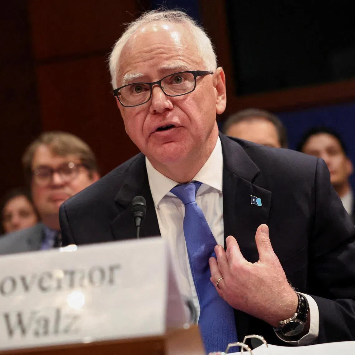 Minnesota Governor Tim Walz said the storm over fraud allegations – and the partisan fights they have fuelled – made it impossible to campaign effectively while governing.