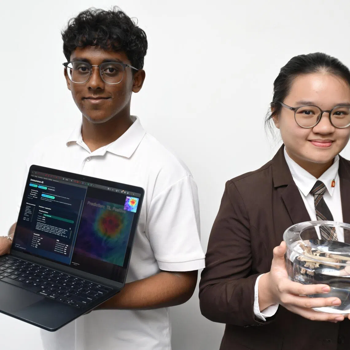 Aneesh Bondugula (left) developed an AI project to predict how patients will respond to cancer immunotherapy, while Shavonne Tok explored the use of discarded chicken bones to remove dye pollutants from water.
