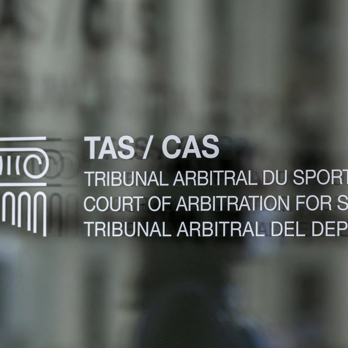 A logo is pictured on the new headquarters for the Court of Arbitration for Sport (CAS), an independent institution that resolves around 900 legal disputes in the field of sport through arbitration and mediation, in Lausanne, Switzerland, June 27, 2022.  REUTERS/Denis Balibouse
