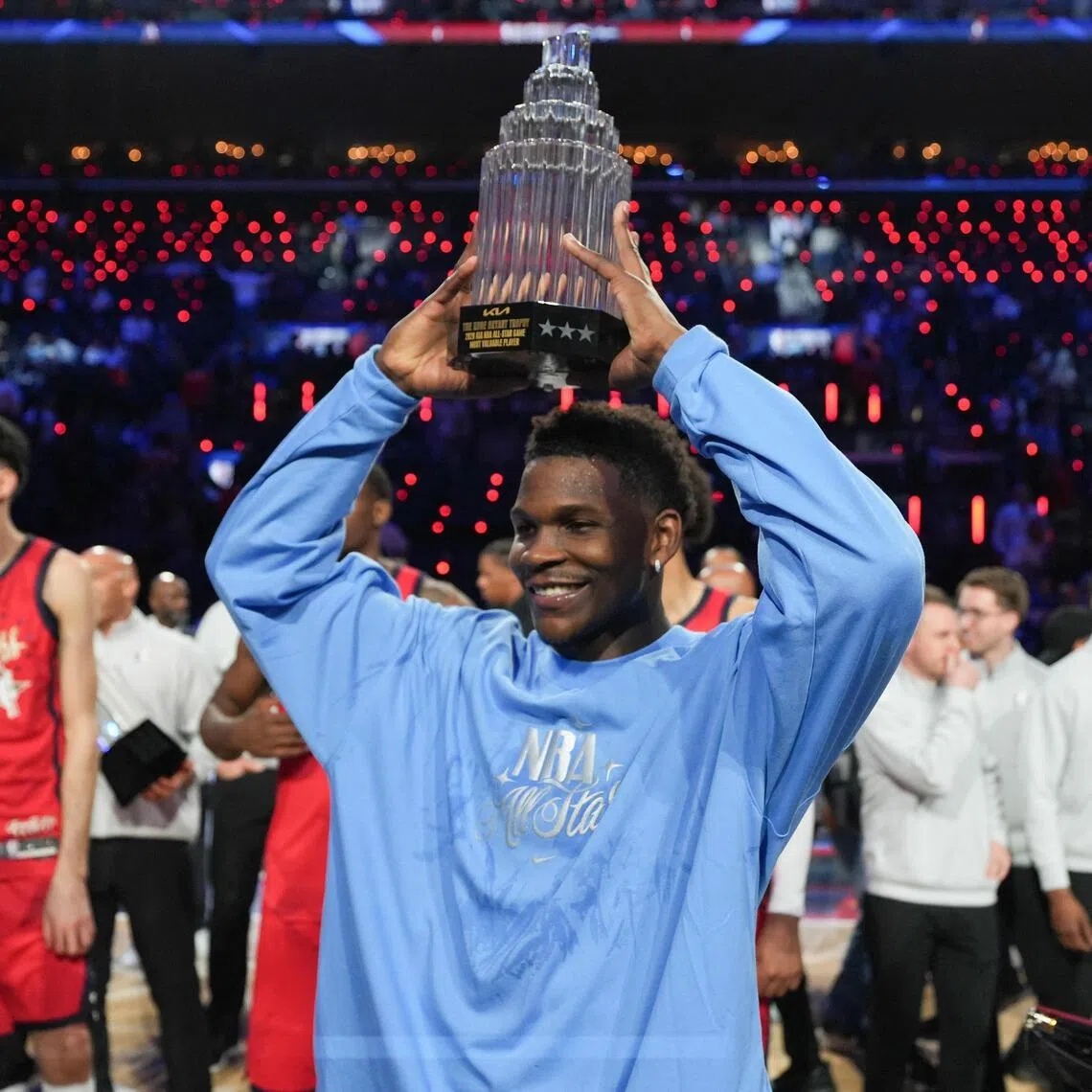 USA Stars' Anthony Edwards of the Minnesota Timberwolves with the Most Valuable Player trophy after the NBA All-Star Game at Intuit Dome on Feb 15.