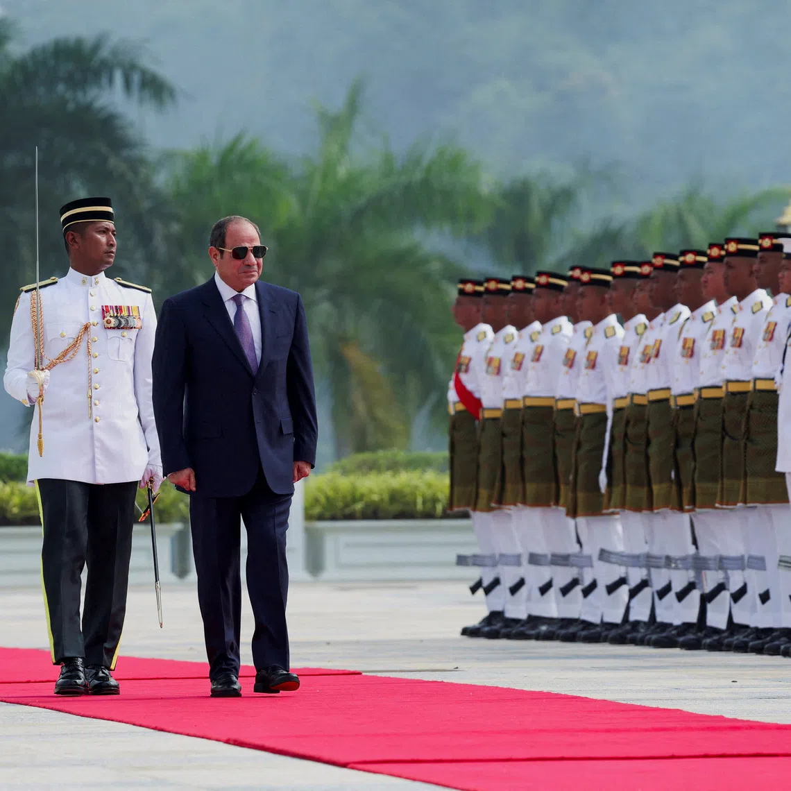 Egyptian President Abdel Fattah al-Sisi inspects a guard of honour during a state welcoming ceremony at the National Palace in Kuala Lumpur, Malaysia, October 10, 2026. REUTERS/Hasnoor Hussain/Pool