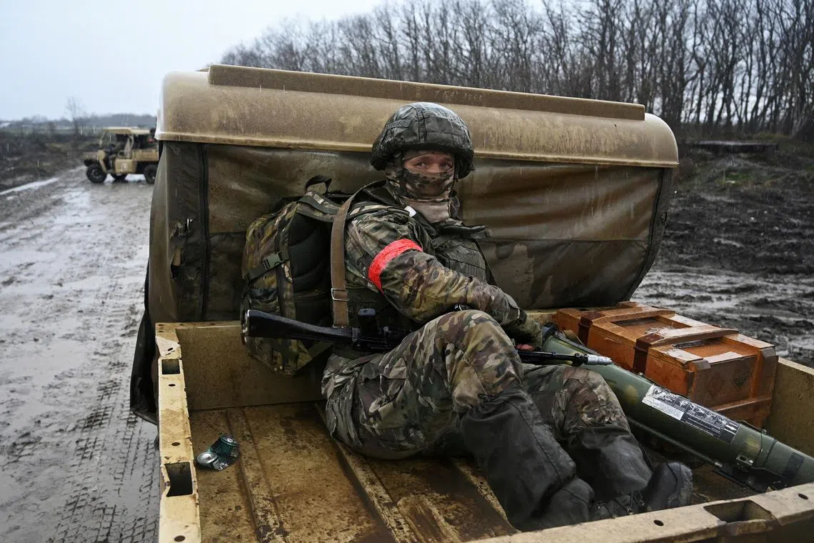 FILE PHOTO: A Russian service member rides in the back of a military buggy during combat training at a firing range, in the course of Russia-Ukraine conflict, in Krasnodar region, Russia December 12, 2024. REUTERS/Sergey Pivovarov/File Photo