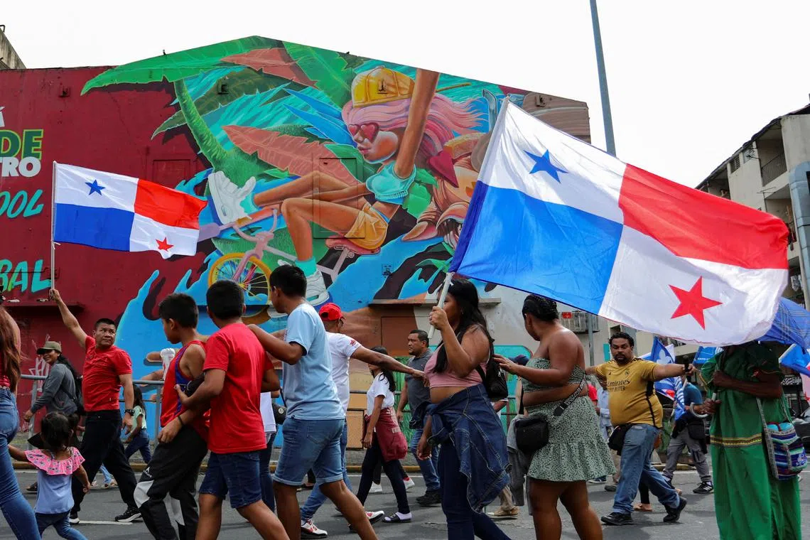 Demonstrators march in remembrance of the Panamanian students who lost their lives during the 1964 riots over the U.S. control of the Panama Canal, known as Martyr's Day, which played a significant role in leading to the signing of the Torrijos-Carter Treaties in 1977, in Panama City, Panama January 9, 2025. REUTERS/Aris Martinez