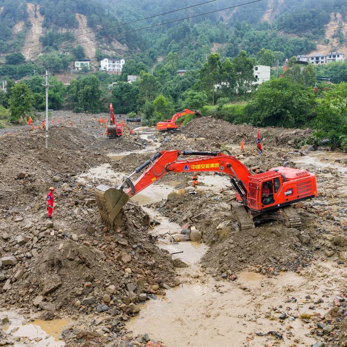 Nine were killed in the municipality of Chongqing after torrential rainfall resulted in flash floods and landslides.