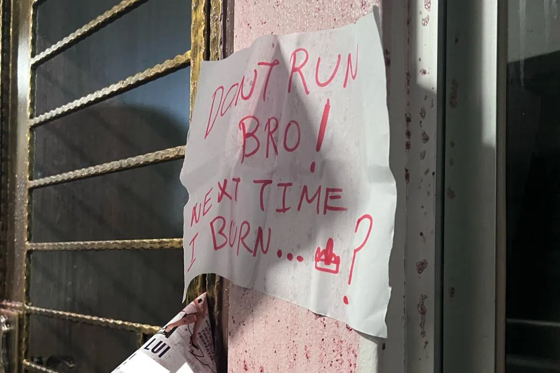 A note with the warning “Don’t run bro... next time I burn” was stuck on the wall next to the gate.