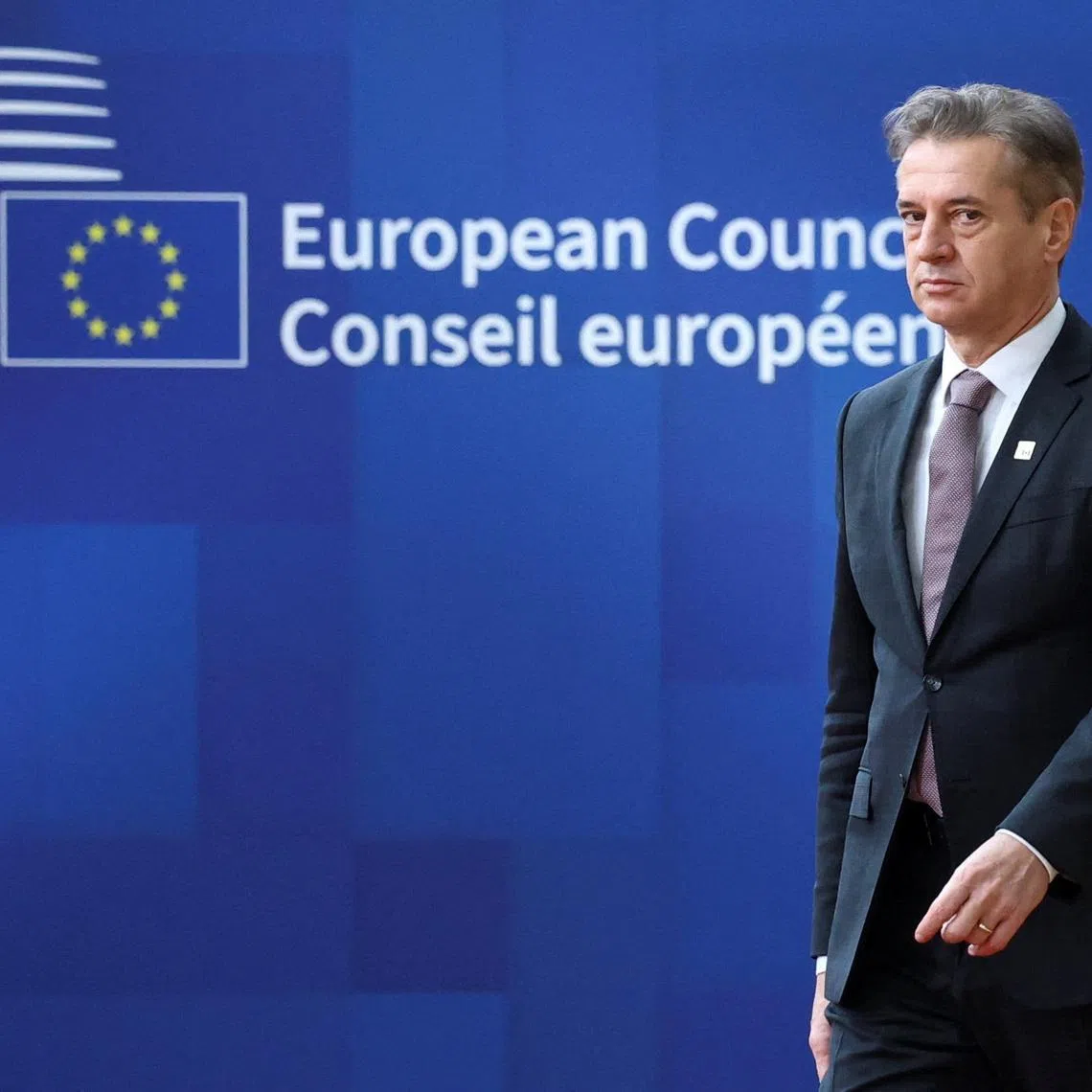 Slovenia's Prime Minister Robert Golob arrives at a European Union leaders' summit in Brussels, Belgium, December 18, 2025. REUTERS/Yves Herman