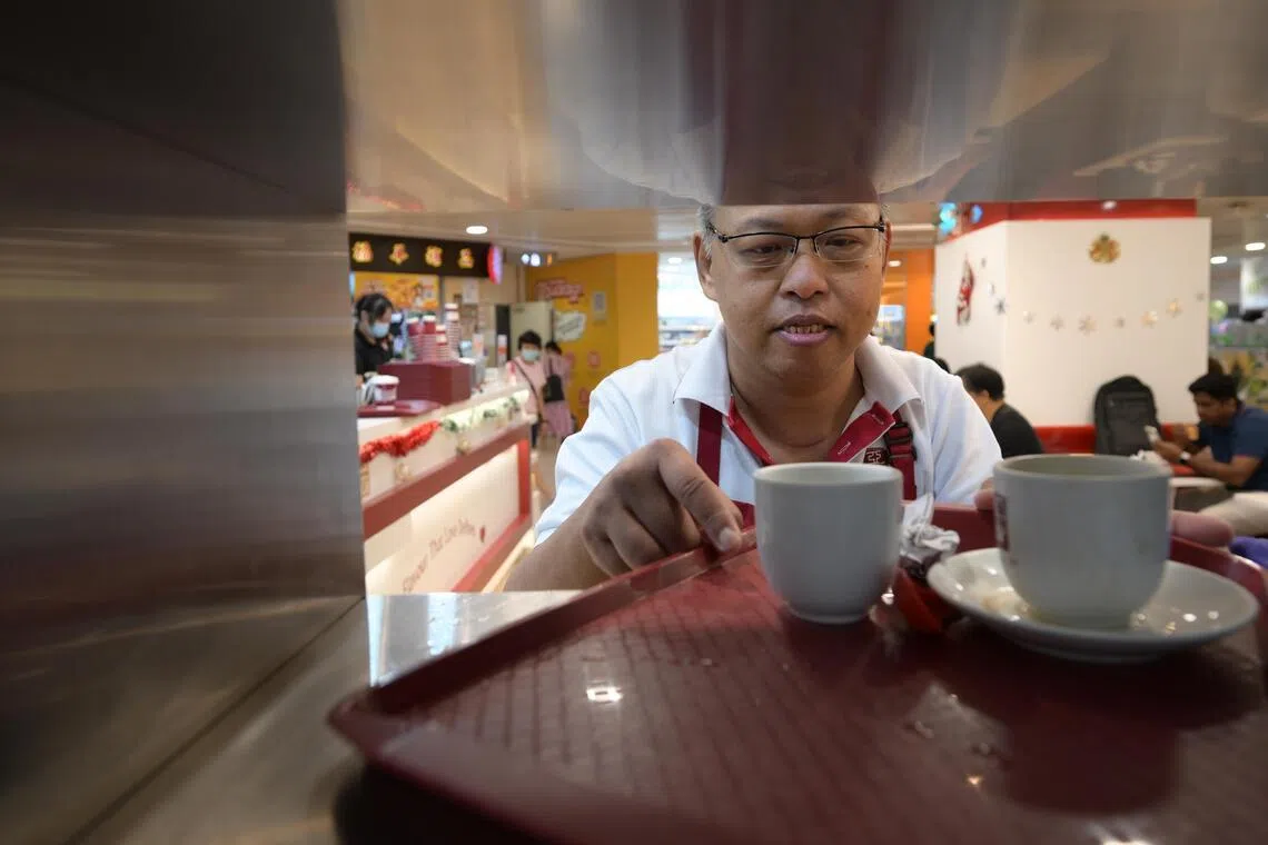 wqdialysis/ST20251218_202526800724/Ng Sor Luan/NKF patient Mr Chew Teck Seng, 53, who found a job at Ya Kun Kaya Toast as a cleaner.