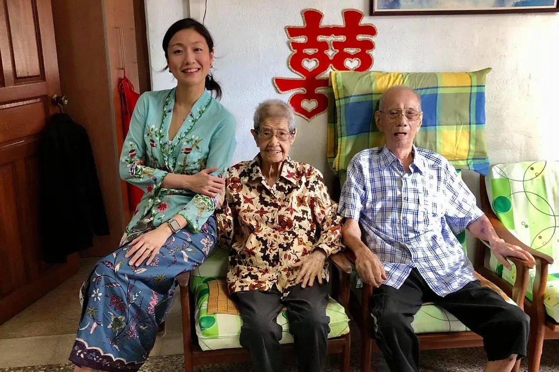 The bride with the grandparents before serving tea in 2020.