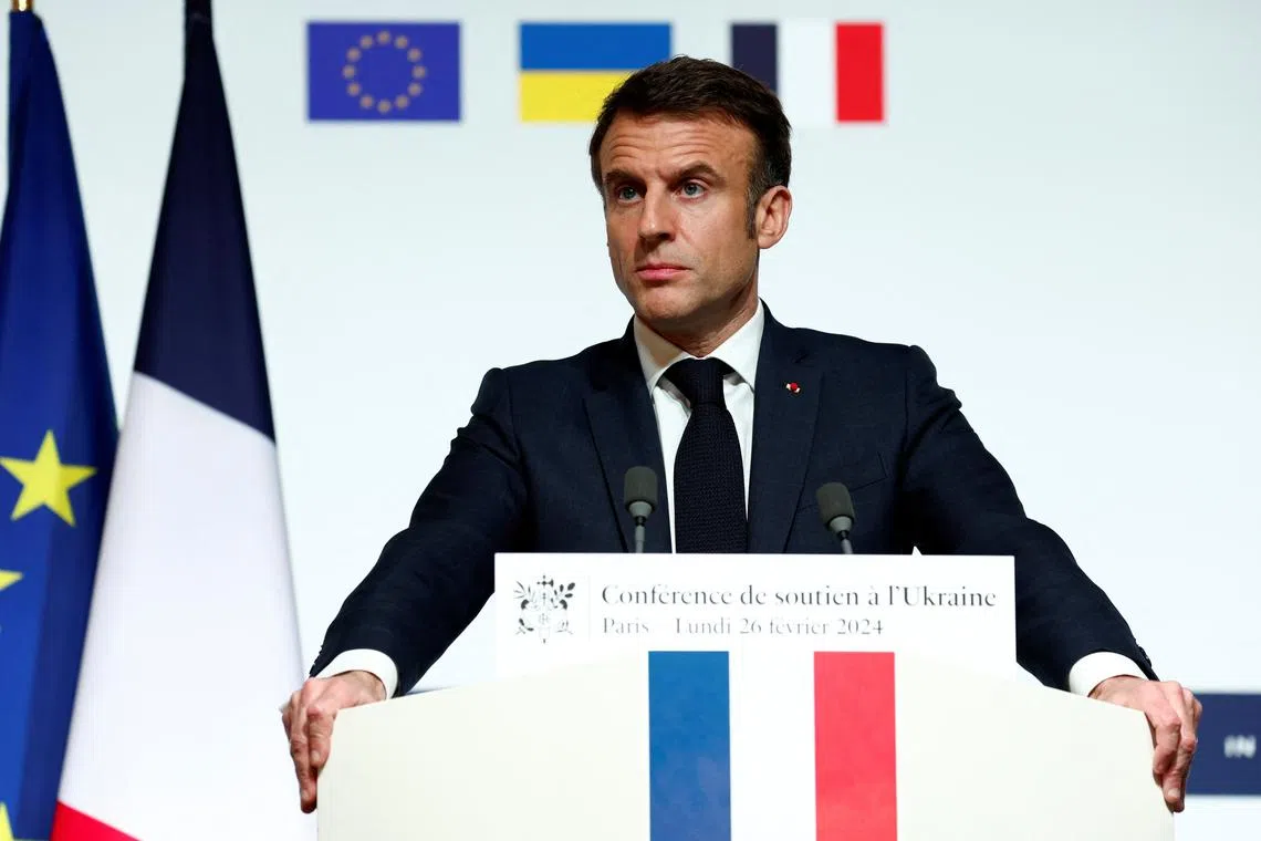 French President Emmanuel Macron speaks during a press conference at the end of the conference in support of Ukraine, with European leaders and government representatives, at the Elysee Palace in Paris, France, February 26, 2024. REUTERS/Gonzalo Fuentes/Pool