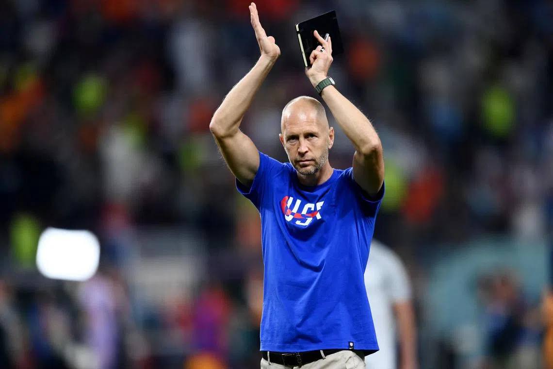 Gregg Berhalter applauds fans after the match as United States are eliminated from the World Cup in Qatar. His contract has since run out, and his departure has been followed by two other top officials.
