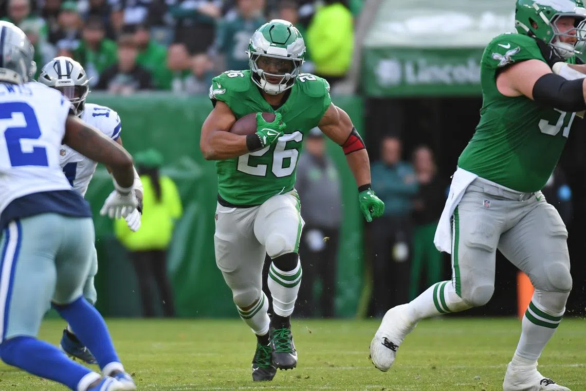 FILE PHOTO: Dec 29, 2024; Philadelphia, Pennsylvania, USA; Philadelphia Eagles running back Saquon Barkley (26) runs with the football during the second quarter against the Dallas Cowboysat Lincoln Financial Field. Mandatory Credit: Eric Hartline-Imagn Images/File photo