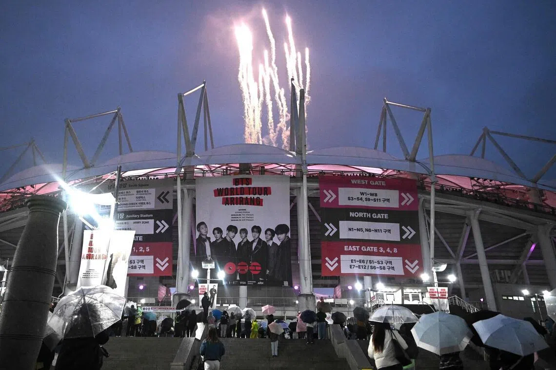 Fireworks explode at a stadium BTS is performing in Goyang, South Korea on April 9, 2026. 