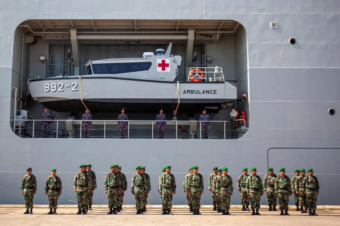 Indonesian soldiers attend the opening ceremony of a joint-military drills Asean Solidarity Exercise at Batu Ampar port on Batam island, Indonesia.