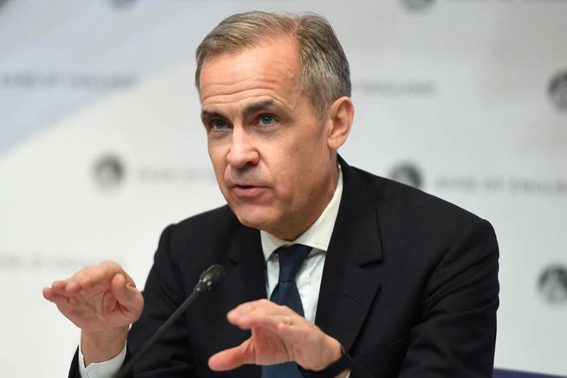 FILE PHOTO: Mark Carney, governor of the Bank of England (BOE) attends a news conference at Bank of England in London, Britain March 11, 2020. Peter Summers/Pool via REUTERS/File Photo