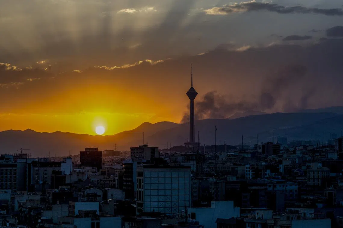 Smoke rising in Tehran after an Israeli air strike on June 16.