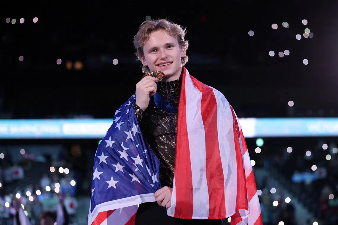 Figure Skating - ISU Grand Prix of Figure Skating - Grand Prix Final - Aichi International Arena, Nagoya, Japan - December 6, 2025  Gold medallist Ilia Malinin of the U.S. celebrates during the men's grand prix final medal ceremony REUTERS/Issei Kato