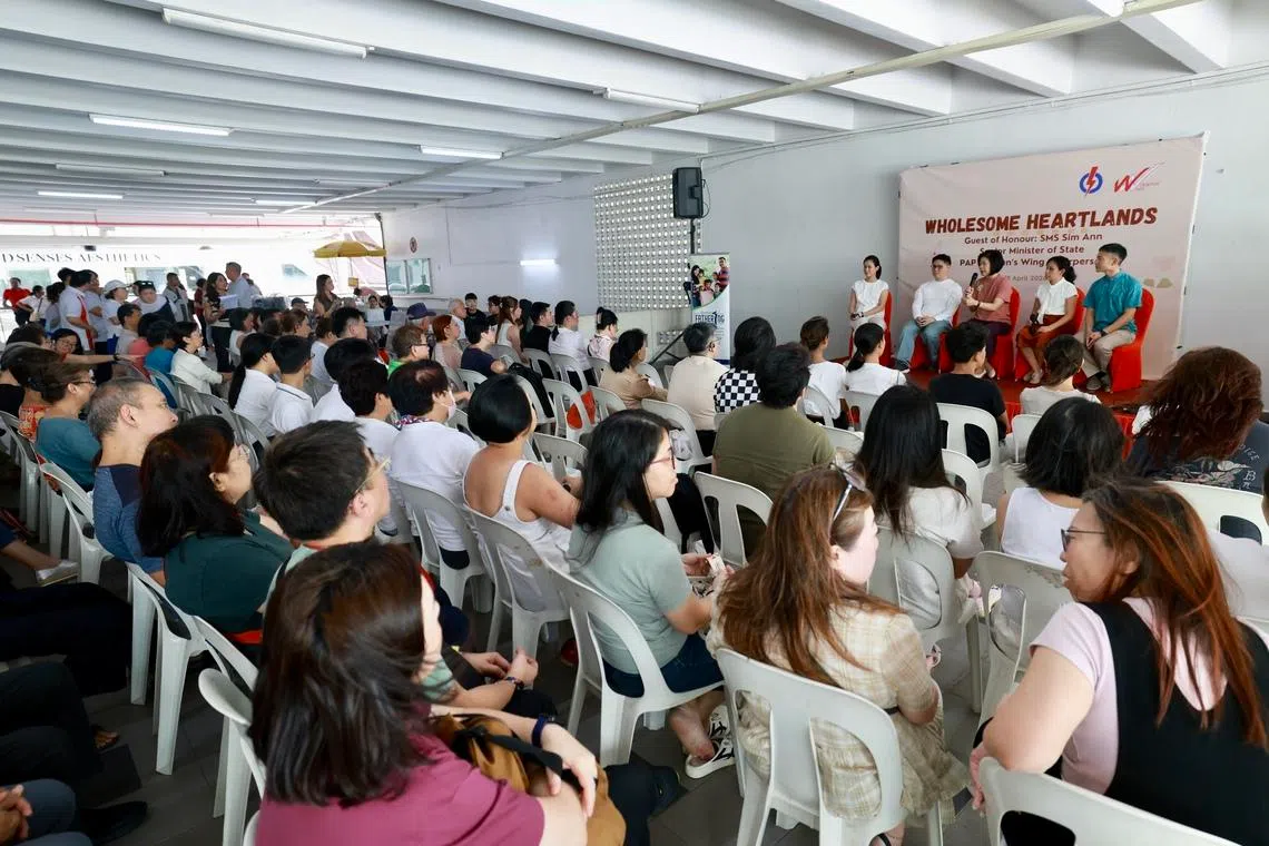 (On stage, from left) Mrs Bernadette Giam, Mr Foo Cexiang, Ms Sim Ann, Ms Elysa Chen, and Mr Shawn Loh speaking to participants of the community dialogue session on April 18.