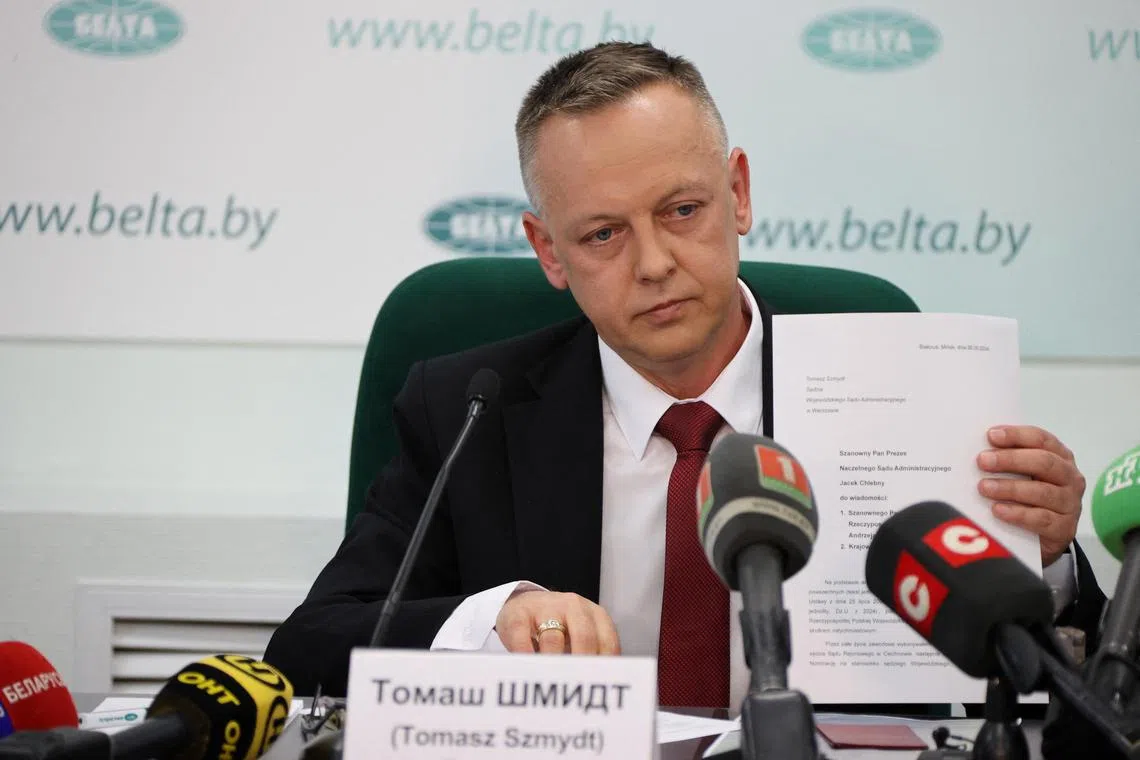 Mr Tomasz Szmydt, a Polish judge who requested political asylum in Belarus, takes part in a press conference in the Belarussian capital, Minsk.