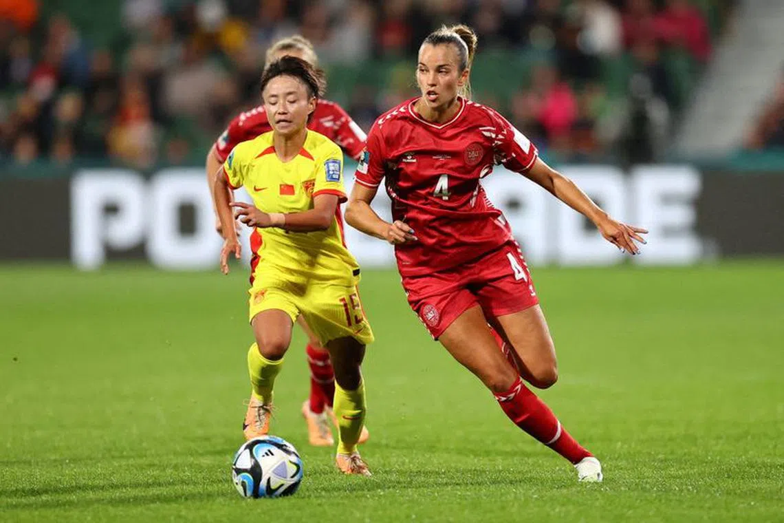 FILE PHOTO: Soccer Football - FIFA Women’s World Cup Australia and New Zealand 2023 - Group D - Denmark v China - Perth Rectangular Stadium, Perth, Australia - July 22, 2023 Denmark's Rikke Sevecke in action with China's Zhang Linyan REUTERS/Luisa Gonzalez/File Photo