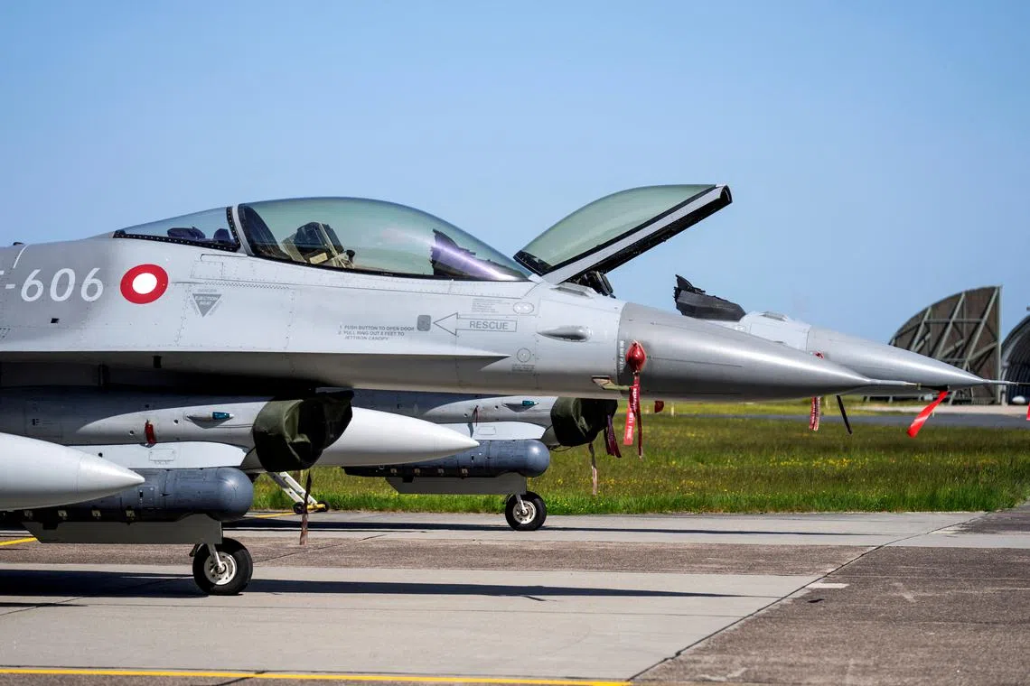 Danish F-16 fighter jets are seen at Fighter Wing Skrydstrup near Vojens, Denmark May 25, 2023. Ritzau Scanpix/Bo Amstrup via REUTERS/ File Photo