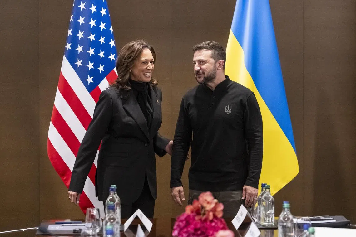 US Vice-President Kamala Harris (left) is welcomed by Ukrainian President Volodymyr Zelensky, ahead of a bilateral meeting at the peace summit in Switzerland.