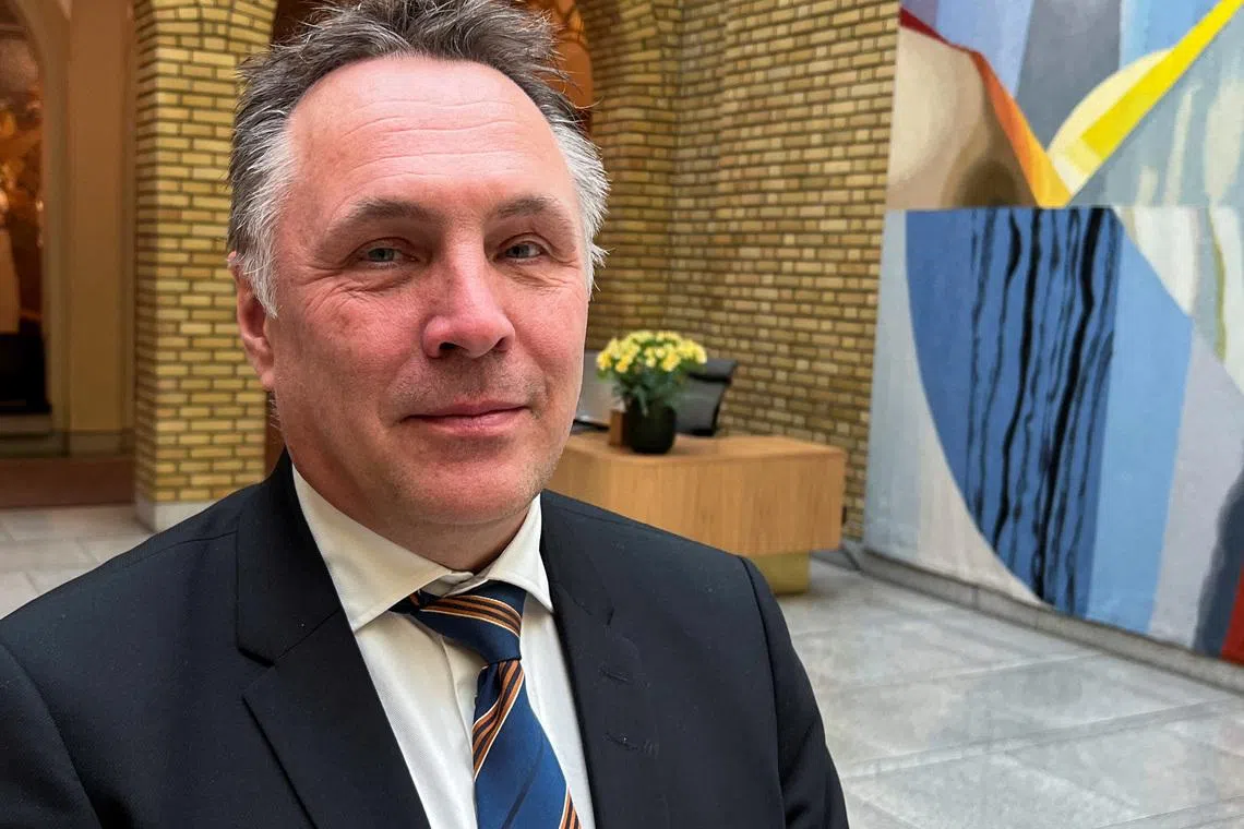 Norwegian Defence Minister Tore O. Sandvik poses for a picture at the Norwegian Parliament in Oslo, Norway, March 19, 2025. REUTERS/Gwladys Fouche