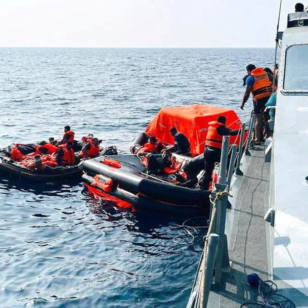 Sri Lanka Navy personnel assist Iranian sailors during a rescue operation after responding to a distress call from their vessel, the Iranian military ship, IRIS Dena, while at sea within Sri Lanka’s maritime search and rescue region, in Indian Ocean, Sri Lanka, March 4, 2026. Sri Lanka Navy/Handout via REUTERS
