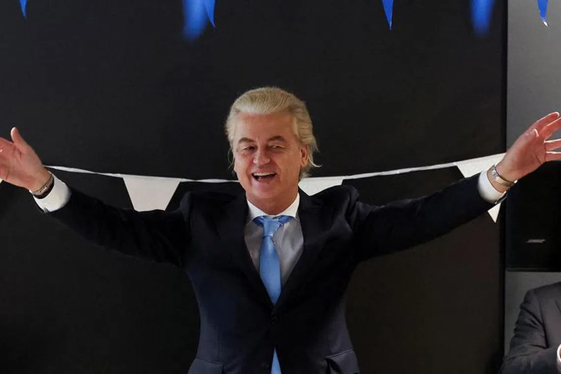FILE PHOTO: Dutch far-right politician and leader of the PVV party, Geert Wilders gestures as he meets with members of his party at the Dutch Parliament, after the Dutch parliamentary elections, in The Hague, Netherlands November 23, 2023. REUTERS/Yves Herman/File photo