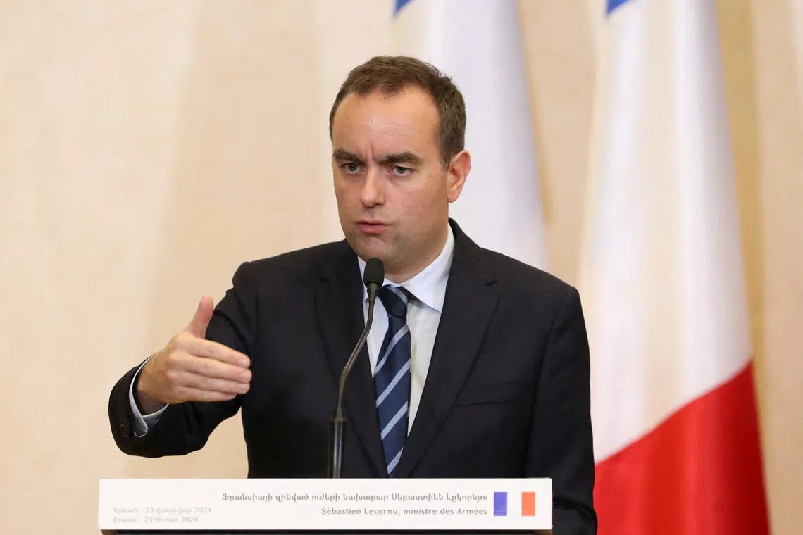 FILE PHOTO: French Defence Minister Sebastien Lecornu attends a press conference following talks with Armenian Defence Minister Suren Papikyanin in Yerevan, Armenia, February 23, 2024. Hayk Baghdasaryan/Photolure via REUTERS/File Photo