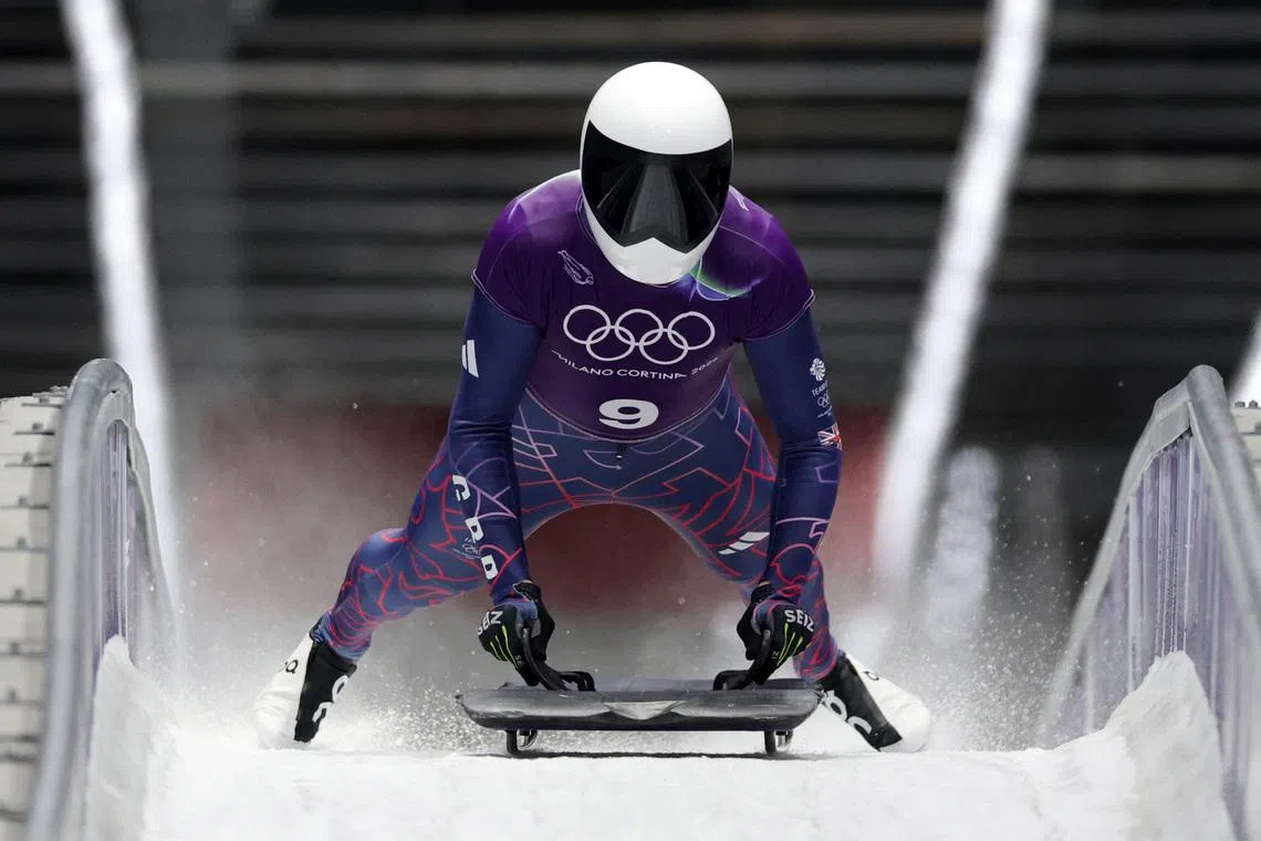 Milano Cortina 2026 Olympics - Skeleton - Men Official Training Heat 3 - Cortina Sliding Centre, Cortina d'Ampezzo, Italy - February 10, 2026.  Matt Weston of Britain in action during training REUTERS/Athit Perawongmetha