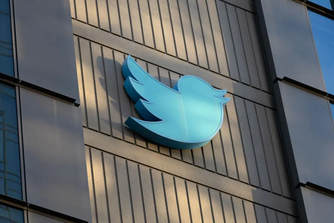 FILE PHOTO: In this file photo taken on October 28, 2022, the Twitter logo is seen on the exterior of Twitter headquarters in San Francisco, California.