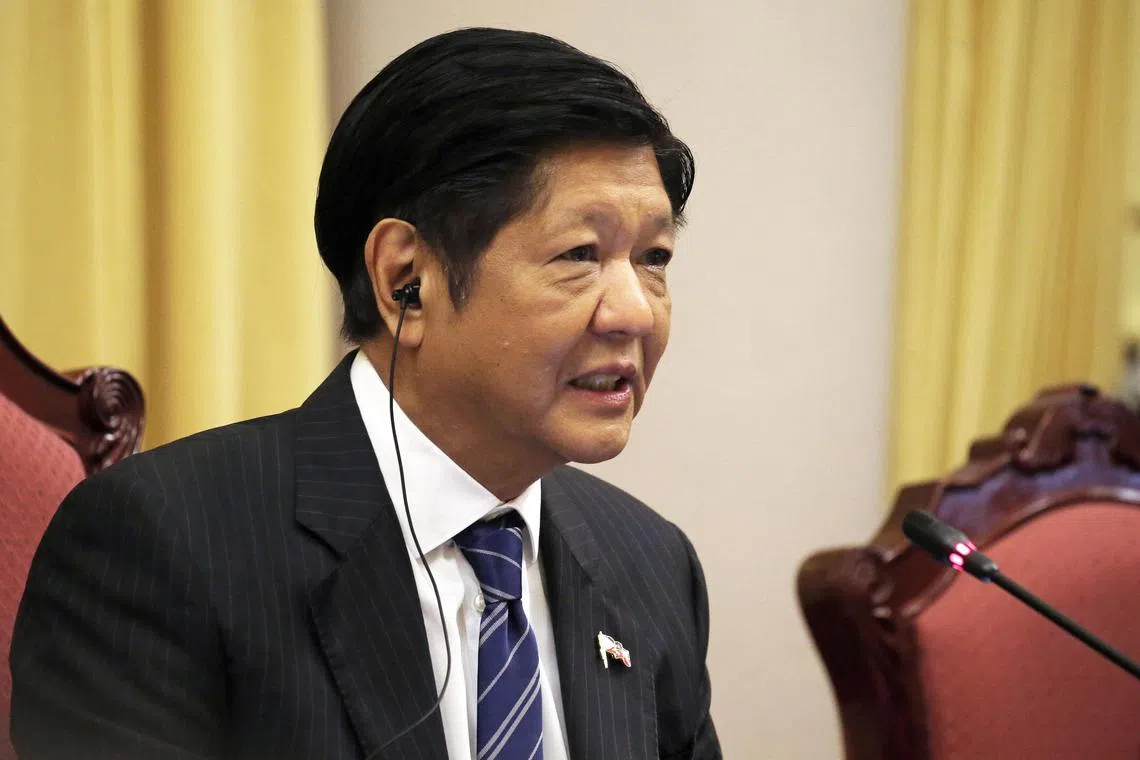 epa11113303 Philippine President Ferdinand Marcos Jr. speaks to Vietnamese President during a meeting at the presidential palace in Hanoi, Vietnam, 30 January 2024. Marcos is on an official visit to Vietnam from 29 to 30 January 2024.  EPA-EFE/LUONG THAI LINH