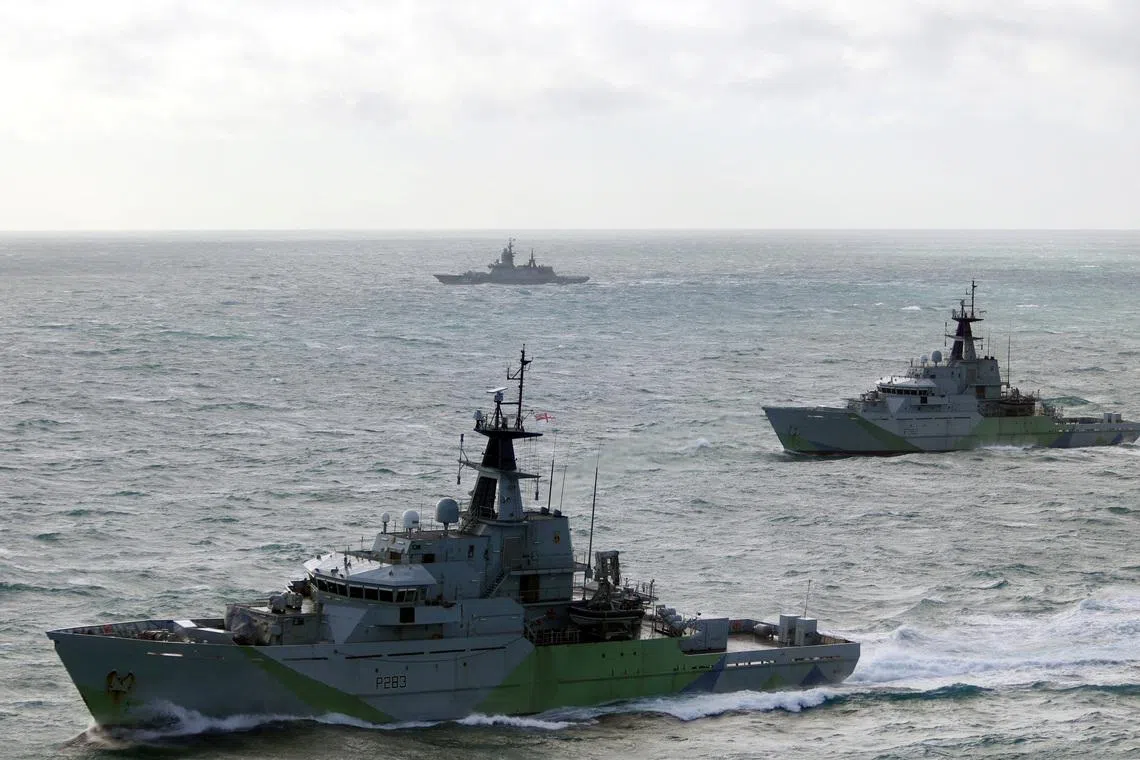 HMS Mersey (P283) and HMS Severn (P282), two River-class offshore patrol vessels of the British Royal Navy, shadow Russian corvette Boikiy, in the waters of the English Channel, in this handout image obtained by Reuters on January 23, 2026. UK MOD/Handout via REUTERS
