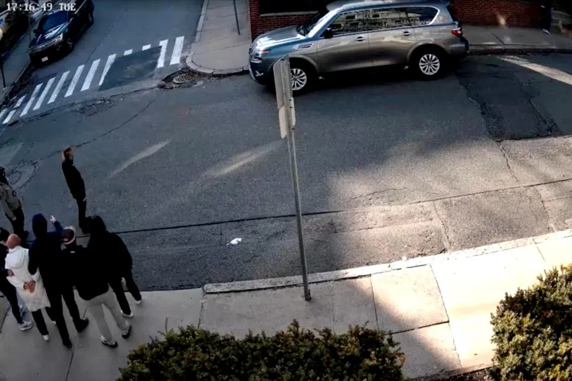 Masked and plainclothes agents take Tufts University Turkish doctoral student Rumeysa Ozturk into custody near her home.