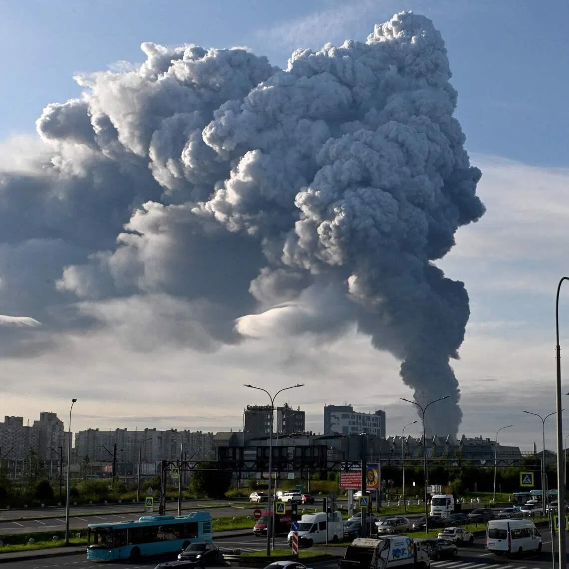 Smoke rises from a warehouse for a Russian e-commerce giant near Saint Petersburg after being hit by Ukrainian drones early on July 24.