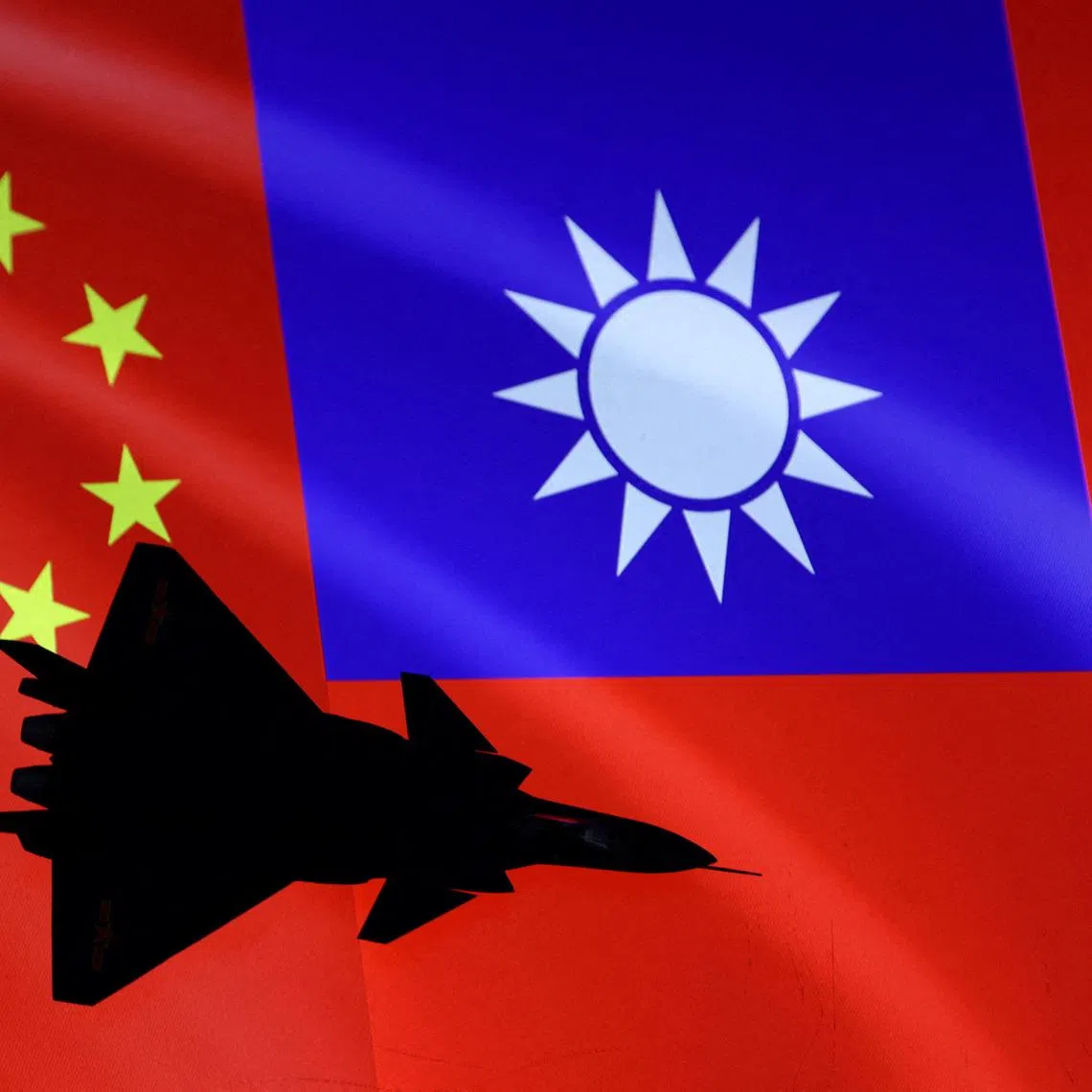 Airplane is seen in front of Chinese and Taiwanese flags in this illustration, August 6, 2022.