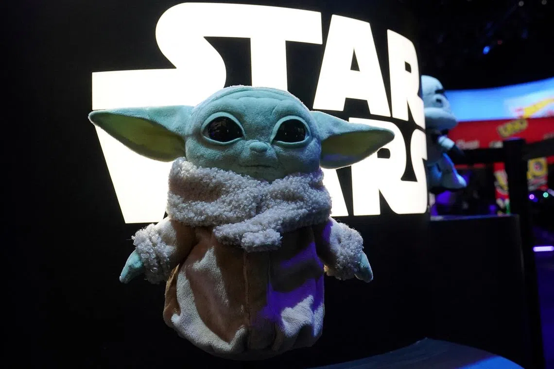 FILE PHOTO: A Baby Yoda toy from Mattel is pictured in the Manhattan borough of New York City, New York, U.S., February 21, 2020. REUTERS/Carlo Allegri/File Photo