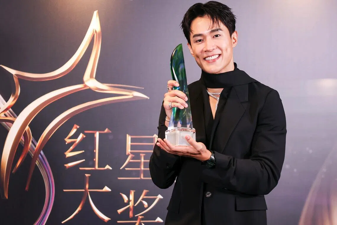 Tyler Ten with his Best Supporting Actor award.