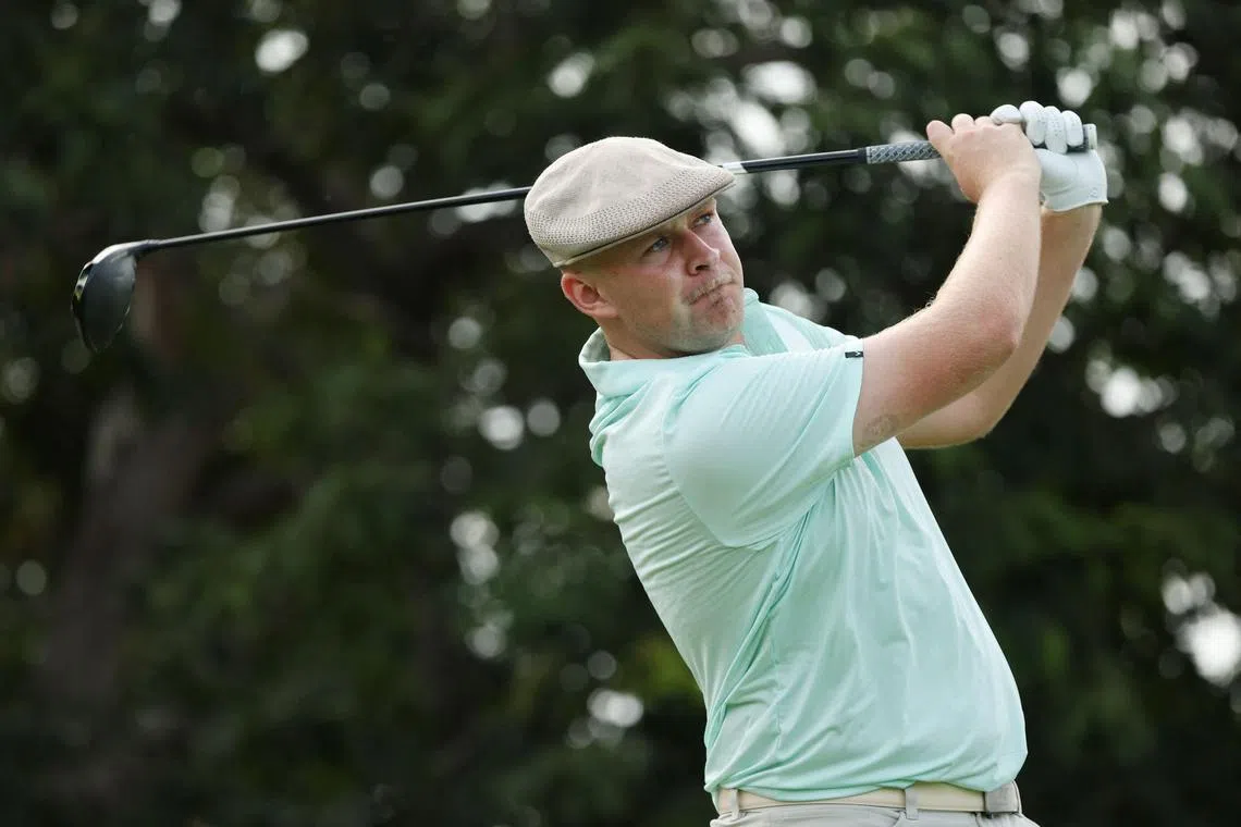 Harry Hall of England plays his shot from the fifth tee during the first round of the Sony Open.