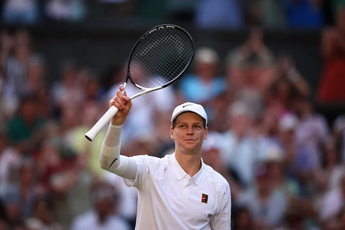 Italy's Jannik Sinner celebrates after victory over Serbia's Novak Djokovic in their semi-final at Wimbledon.