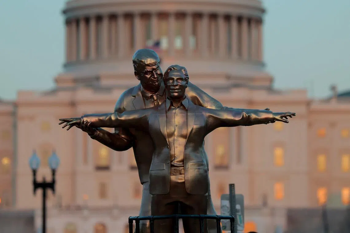 The statue showed Epstein standing at the bow of a ship with his arms stretched out, while Mr Trump stood behind him holding his wrists.