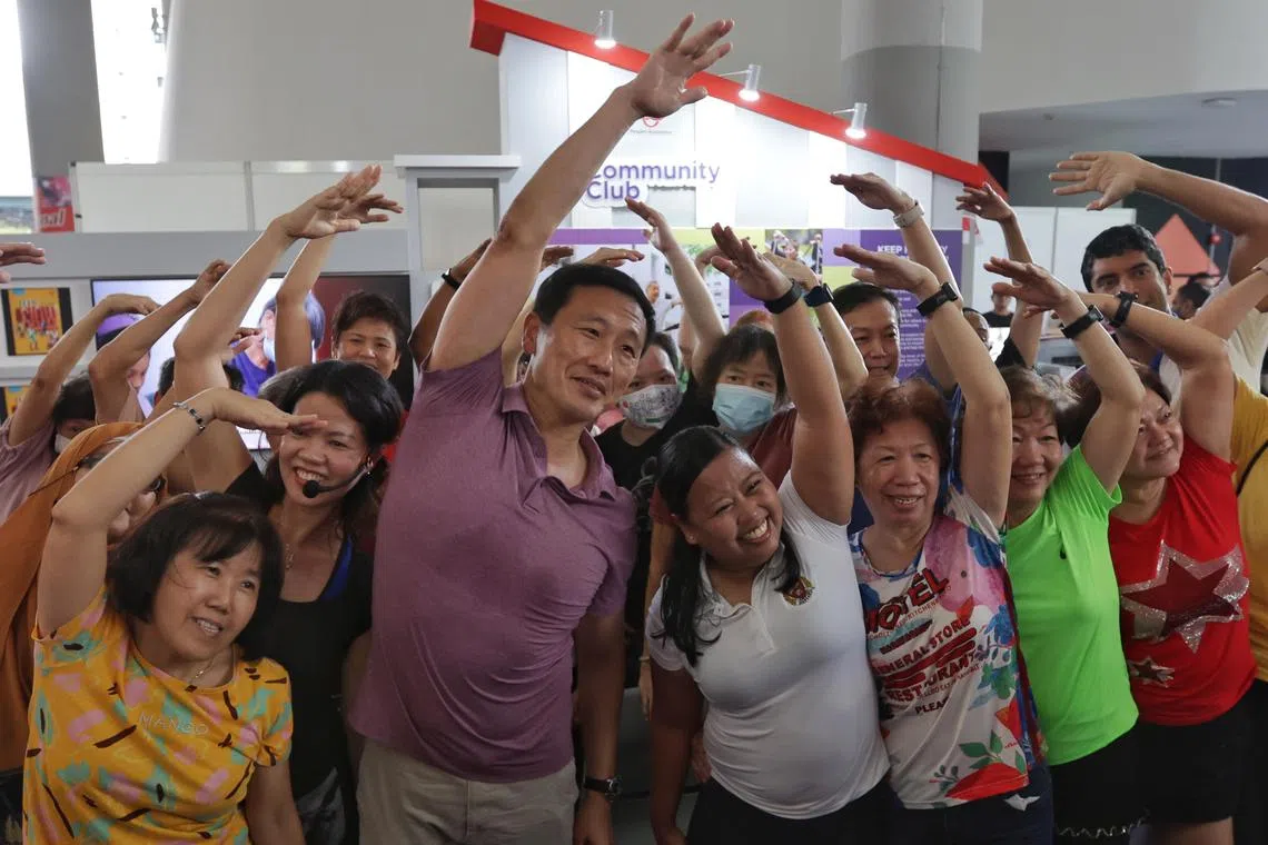 Minister for Health, Mr Ong Ye Kung in a group photo with the attendees at the Healthier SG Roadshow at Kampung Admiralty Community Plaza on Aug 13, 2023.