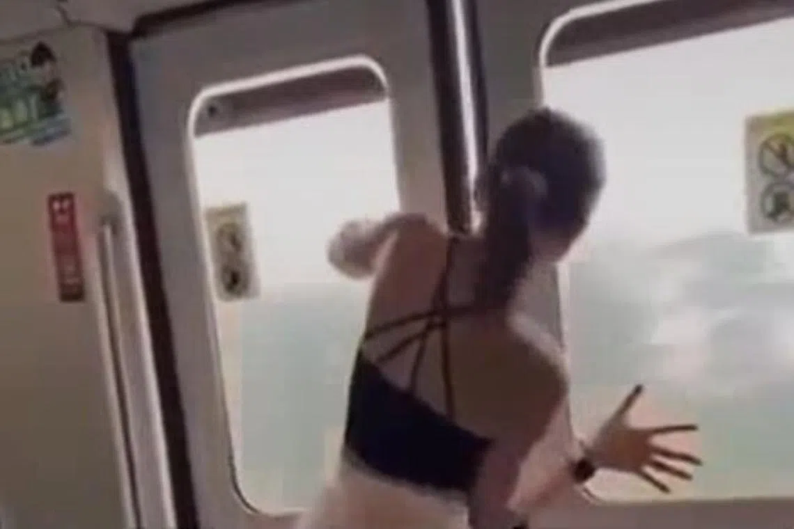 One door budged, briefly opening a crack, before the passenger was stopped by a couple of other passengers, according to an eyewitness. 