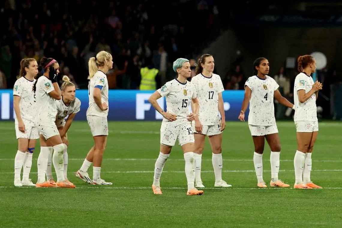 FILE PHOTO: Soccer Football - FIFA Women’s World Cup Australia and New Zealand 2023 - Round of 16 - Sweden v United States - Melbourne Rectangular Stadium, Melbourne, Australia - August 6, 2023 Megan Rapinoe of the U.S. and team mates look dejected as the United States are knocked out of the World Cup REUTERS/Asanka Brendon Ratnayake/File Photo