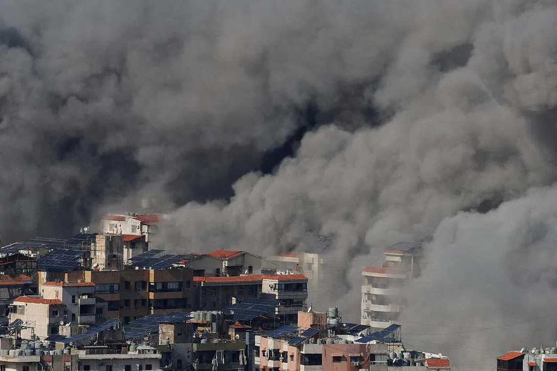 Smoke billowing over Beirut's southern suburbs after an Israeli strike, amid the ongoing hostilities between Hezbollah and Israeli forces, as seen from Baabda, Lebanon Nov 12, 2024.