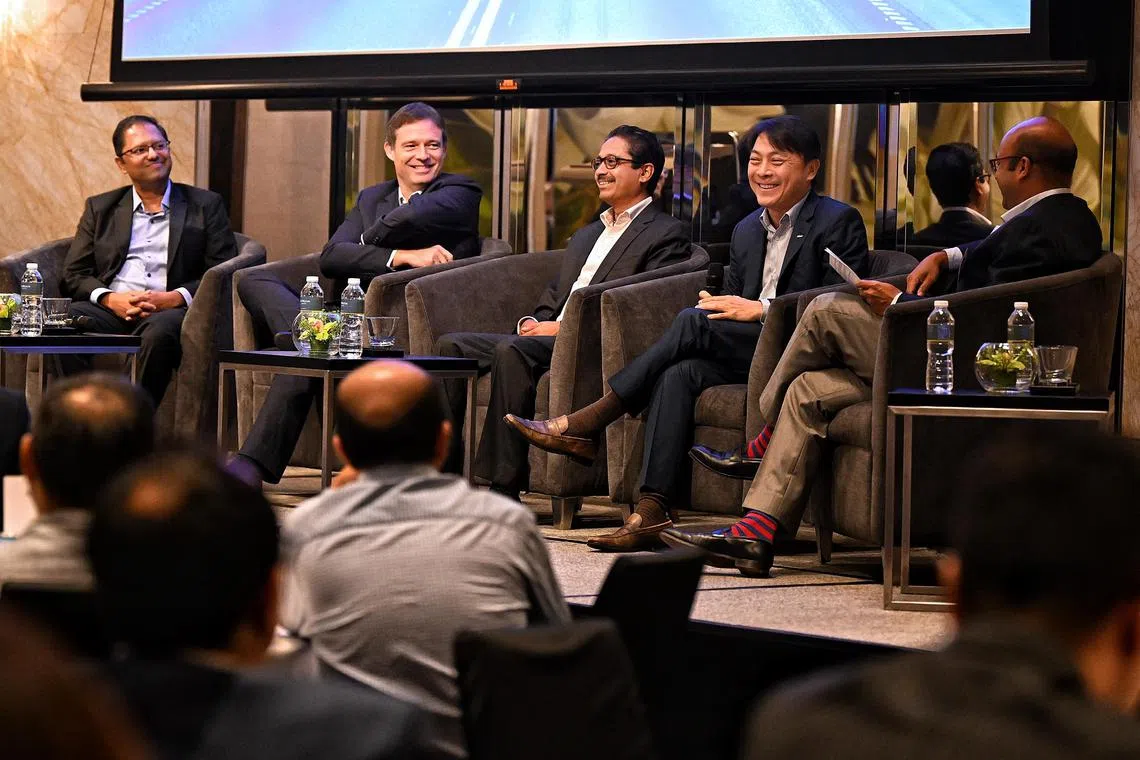 From left: Luke Pais, EY Asia-Pacific Private Equity Leader, Olivier Gergele, Asia-Pacific EY-Parthenon Consumer Leader, N. Muthukumar, CEO for operation & Group CFO, Olam Agri, Louis Lim Lu-Yi, Chief Executive Officer and Executive Director, Keppel Land and Vikram Chakravarthy, EY Asean Strategy and Transactions Leader share a light-hearted moment during the panel discussion at the launch of CEO Outlook Pulse survey on March 31, 2023.