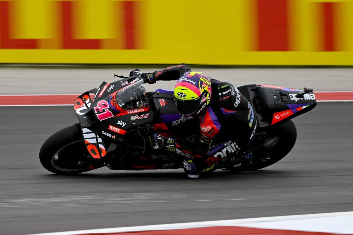 FILE PHOTO: Apr 14, 2024; Austin, TX, USA; Aleix Espargaro (41) of Spain and Aprilia Racing rides in warmups before the start of the MotoGP Grand Prix of The Americas at Circuit of The Americas. Mandatory Credit: Jerome Miron-USA TODAY Sports/File Photo